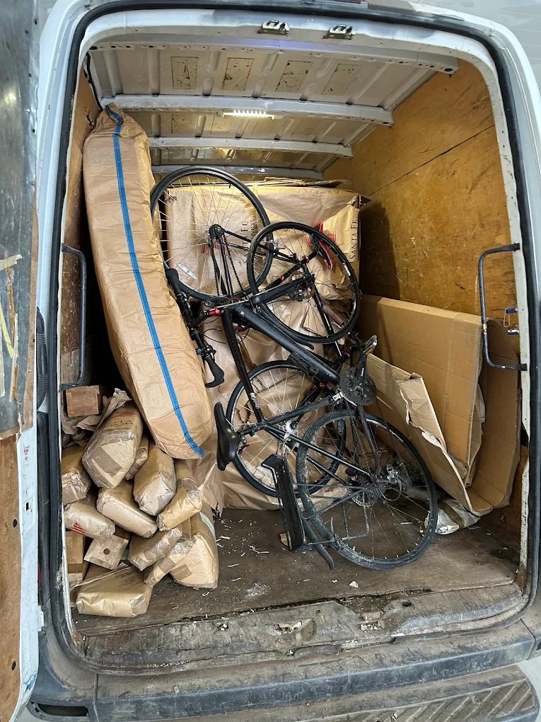 The Sprinter loaded with old lumber, scrap wood and a bicycle, ready to be hauled away